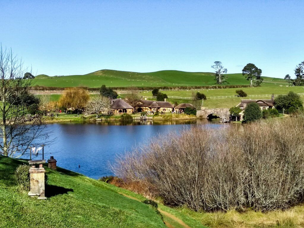view of the green dragon pub over the lake