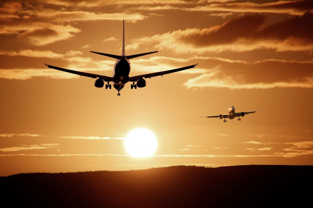 Climate Change and Travel: Is It Time to Change Our Flying Habits? 5 climate change and travel - two planes