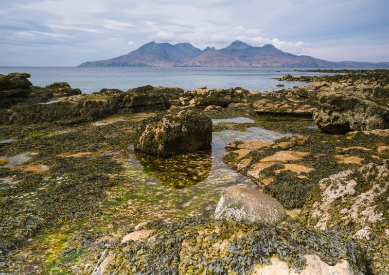 Isle of Eigg coast with a view out towards another island. 