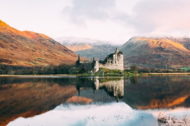 Kilchurn Castle reflected in Loch Awe. It's a must for your Scottish Highlands itinerary.