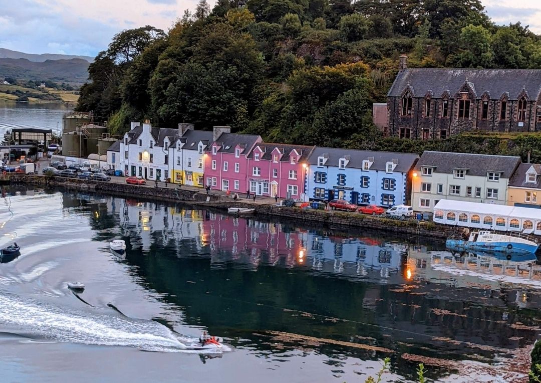 The colourful houses of Portree lining the harbour front. A stop on this itinerary. 