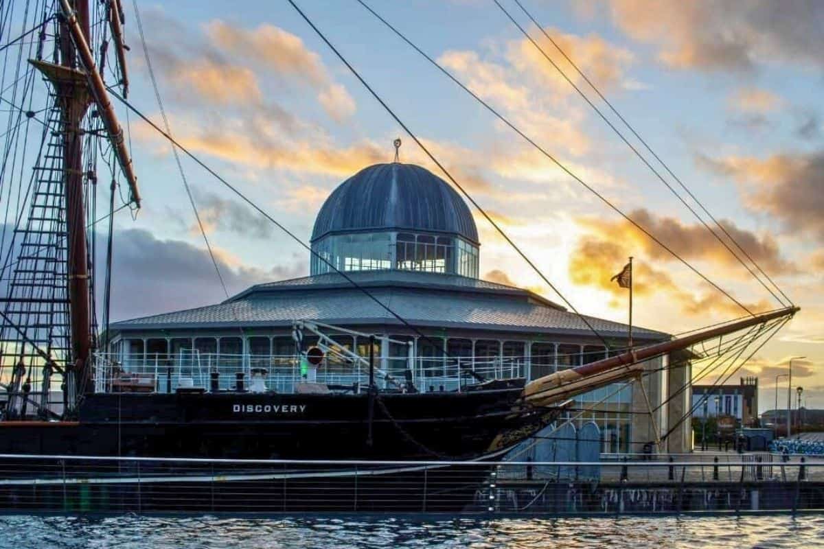 Image of the Discovery sailing ship and museum behind on the dock at Dundee. 
