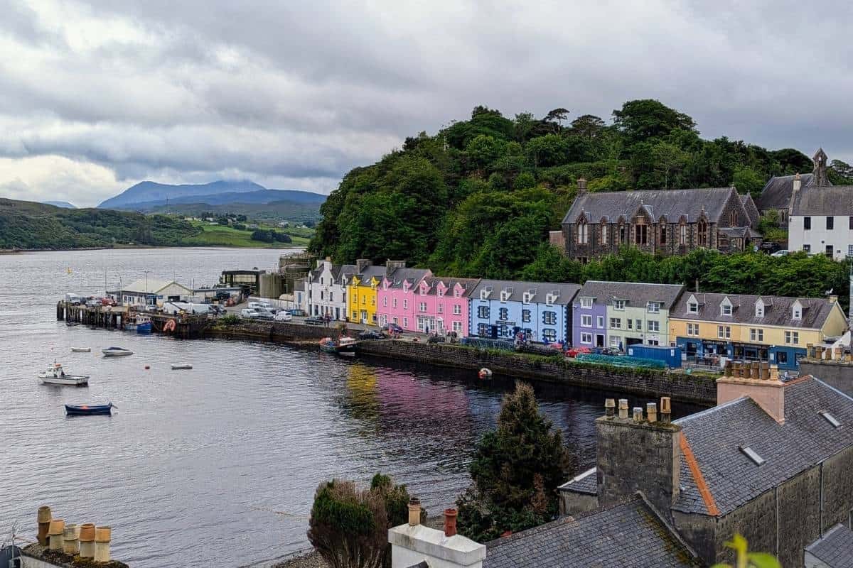 A colourful harbourfront in Portree for best places to stay on the Isle of Skye. 