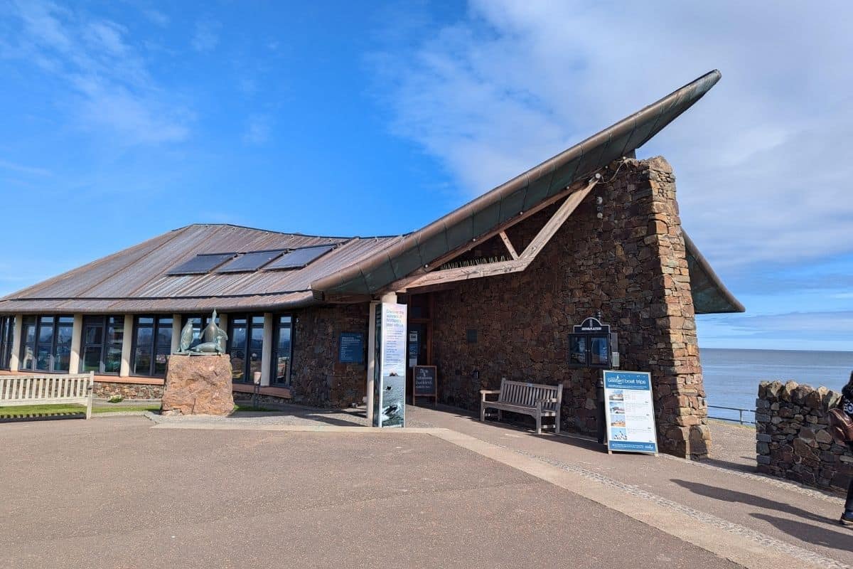 An interesting shaped building with an upturned roof. The Scotish Seabird Centre in North Berwick. 